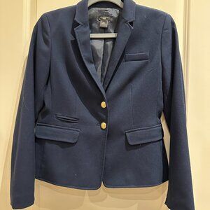 Classic navy blue blazer with gold buttons